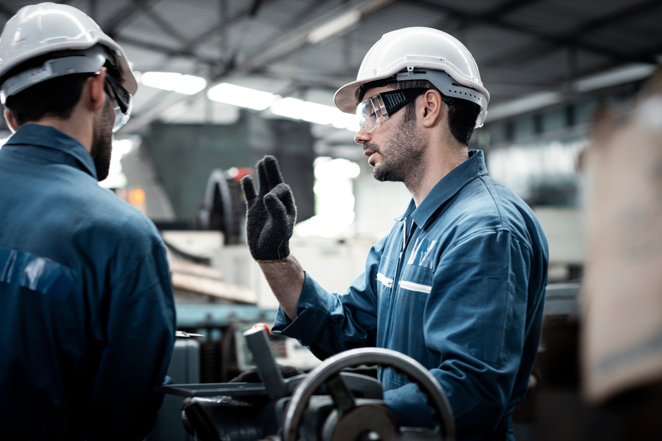 Two men with machines